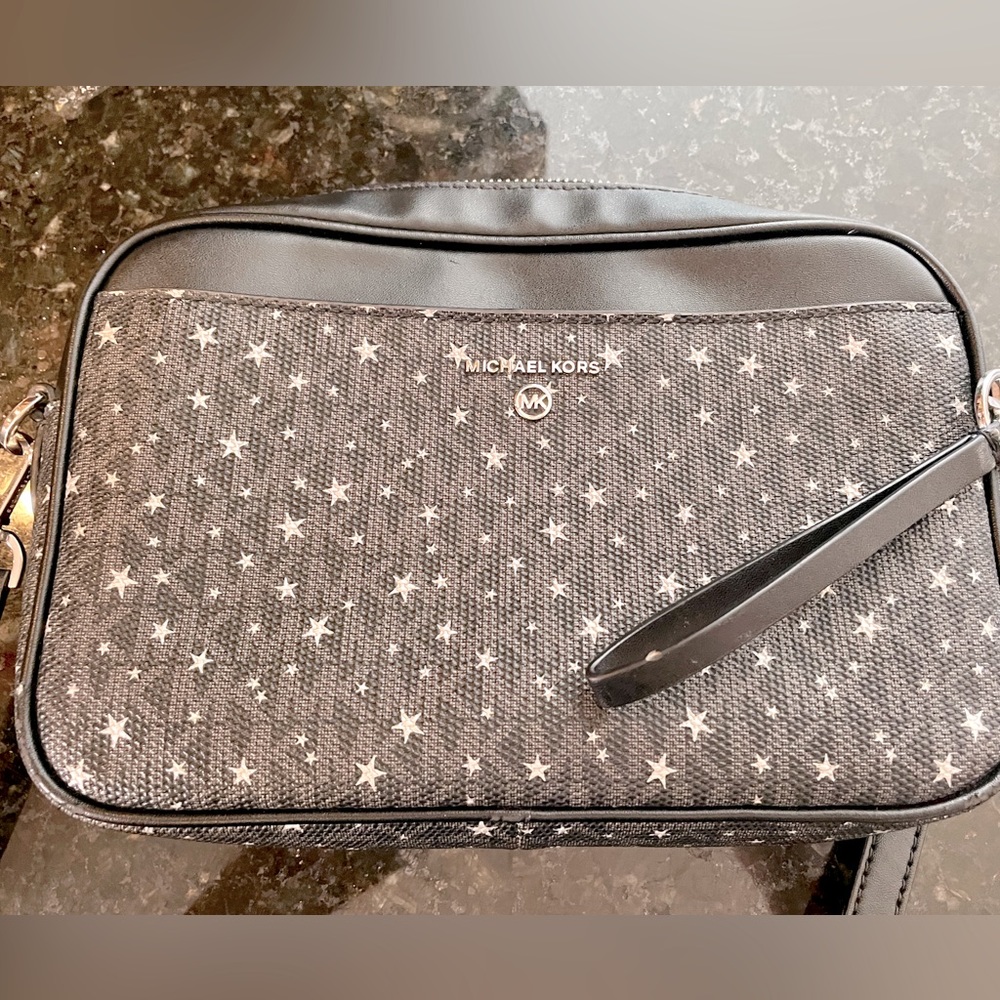 Michael Kors Crossbody purse. Star pattern.